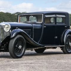 One of only three examples fitted with this attractive body style, this 1931 Bentley ‘Silent Bloc’ Saloon by Vanden Plas was constructed with aluminum panels assembled in such a way as to avoid squeaks and rattles – hence the name. Having avoided the fate of modernization and “specials” that befell so many eight-litres, the ‘Silent Bloc’ survives in the original form in which it was supplied to cigarette manufacturer John Player, complete with its factory-installed frame, engine with closely-numbered SU carburettors, gearbox (no. 8105), and handsomely well-proportioned coachwork. Even the original smoker’s companion is intact. 