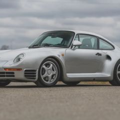The Porsche 959 was manufactured from 1986 to 1993, first as a Group B rally car and later as a road legal production car designed to satisfy FIA homologation regulations requiring at least 200 units be produced. The twin-turbocharged 959 was the world’s fastest street-legal production car when introduced, achieving a top speed of 197 mph, with some variants even surpassing 210 mph. In 2004, Sports Car International named the 959 No. 1 on its list of Top Sports Cars of the 1980s. Combining race performance with luxury comfort and everyday drivability in dry, wet and snowy conditions, it was considered the most technologically advanced road car of its time.